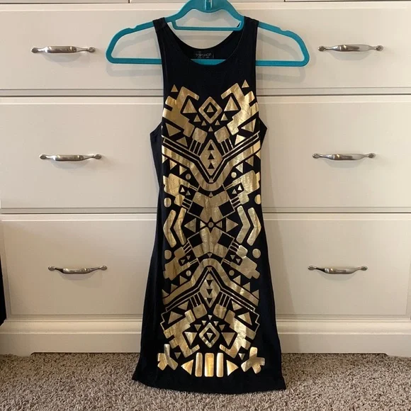 Aztec patterned, black and gold mini dress! Aztec patterned, black and gold mini dress!